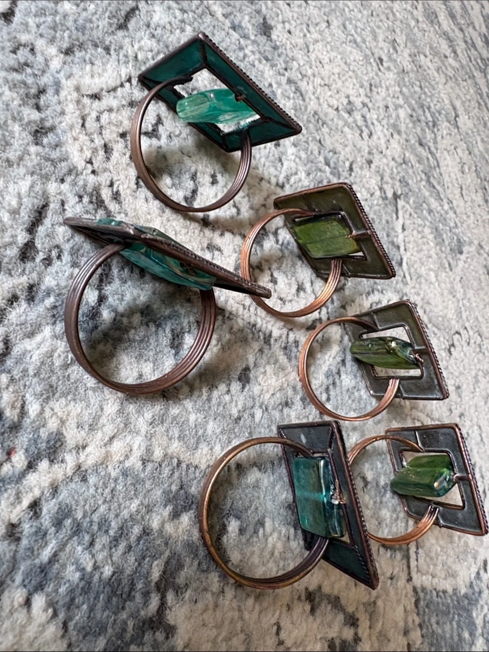 Pier 1 Vintage set of: 6 green blue glass copper napkin rings.